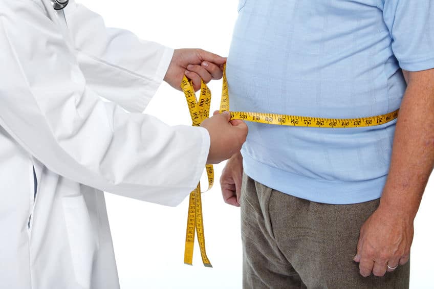 46630142 - Doctor Measuring Obese Man Waist Body Fat. Obesity And Weight Loss.