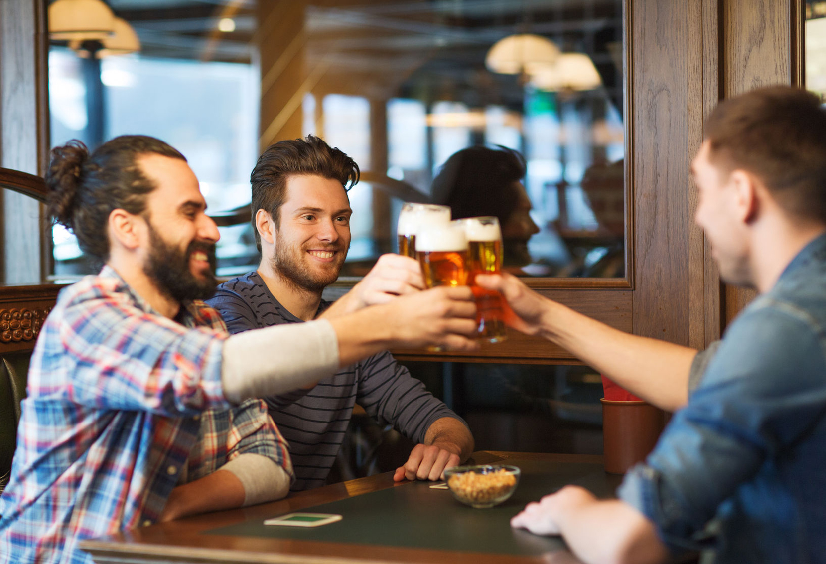 47511000 - People, Men, Leisure, Friendship And Celebration Concept - Happy Male Friends Drinking Beer And Clinking Glasses At Bar Or Pub